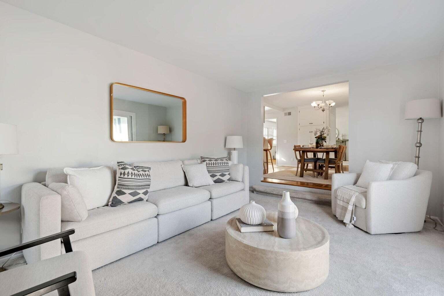 52 Deerhurst Drive Santa Barbara, CA 93117 - Photo 5 of 13 a living room with couches and a potted plant on table