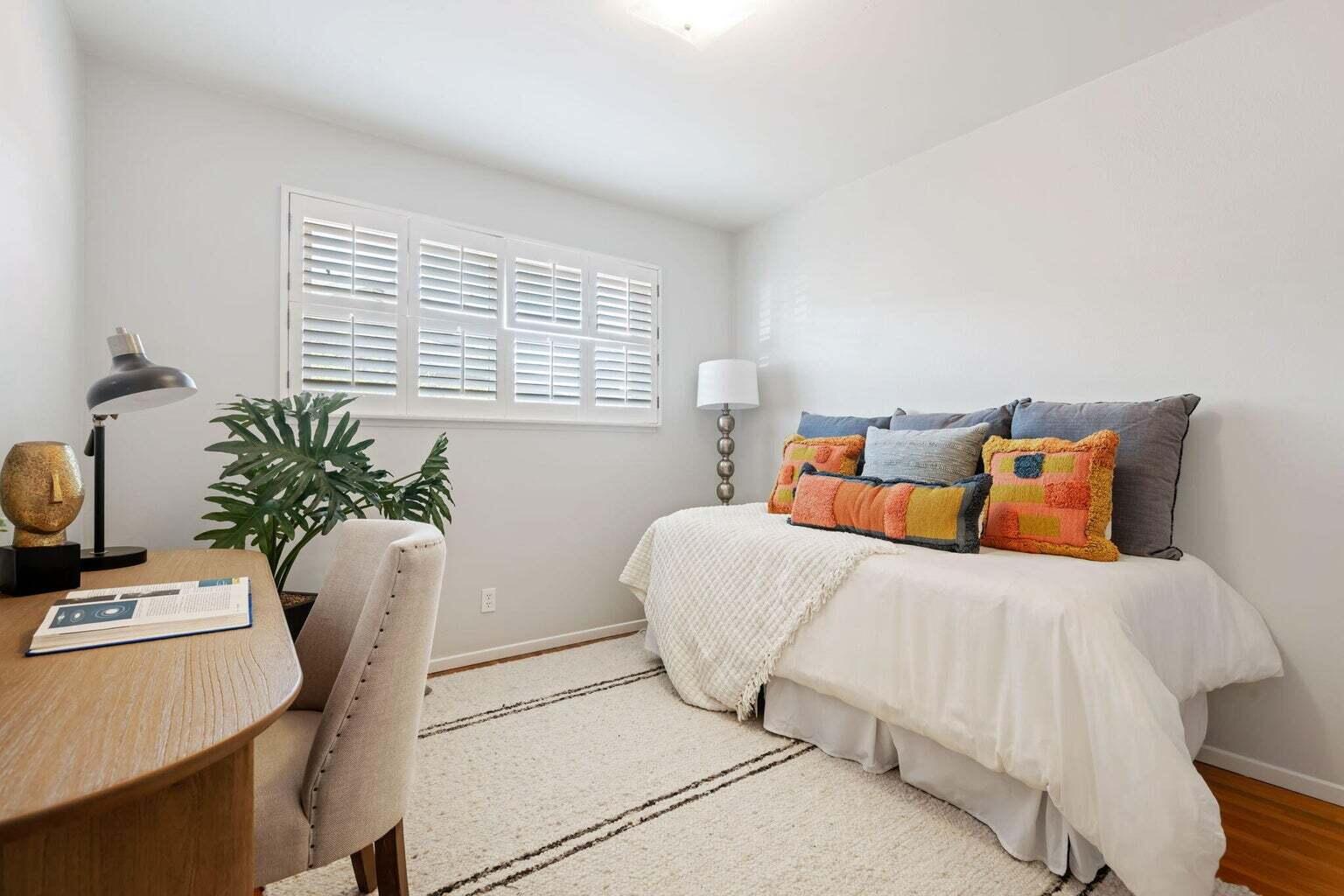 52 Deerhurst Drive Santa Barbara, CA 93117 - Photo 8 of 13 a bedroom with a bed and a table