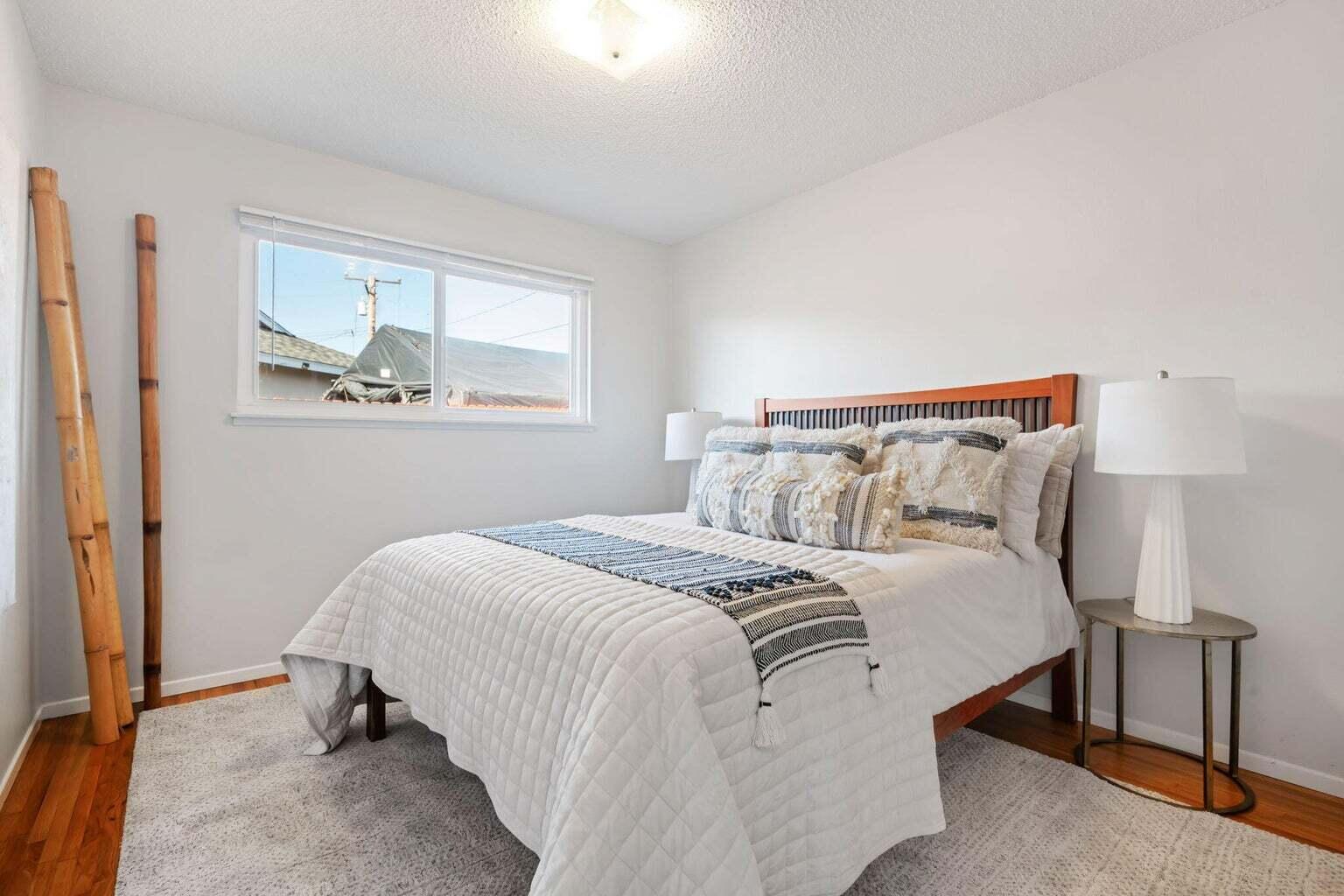 52 Deerhurst Drive Santa Barbara, CA 93117 - Photo 10 of 13 a bedroom with bed and window