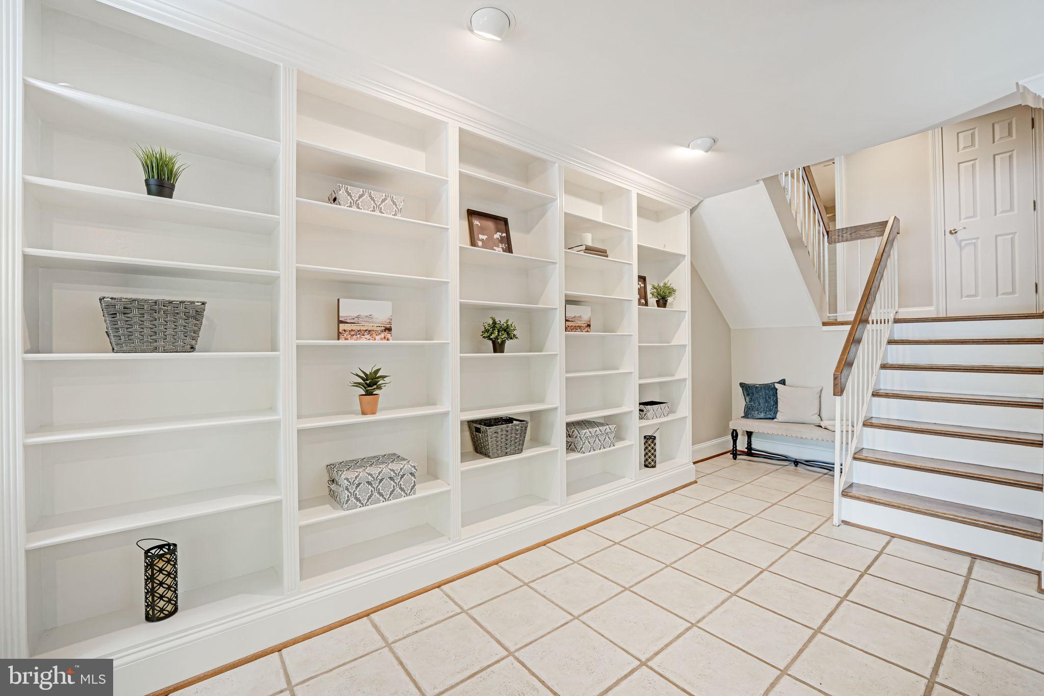 11032 Thrush Ridge Road Reston, VA 20191 - Photo 41 of 66 Built in bookcases along a long wall.
