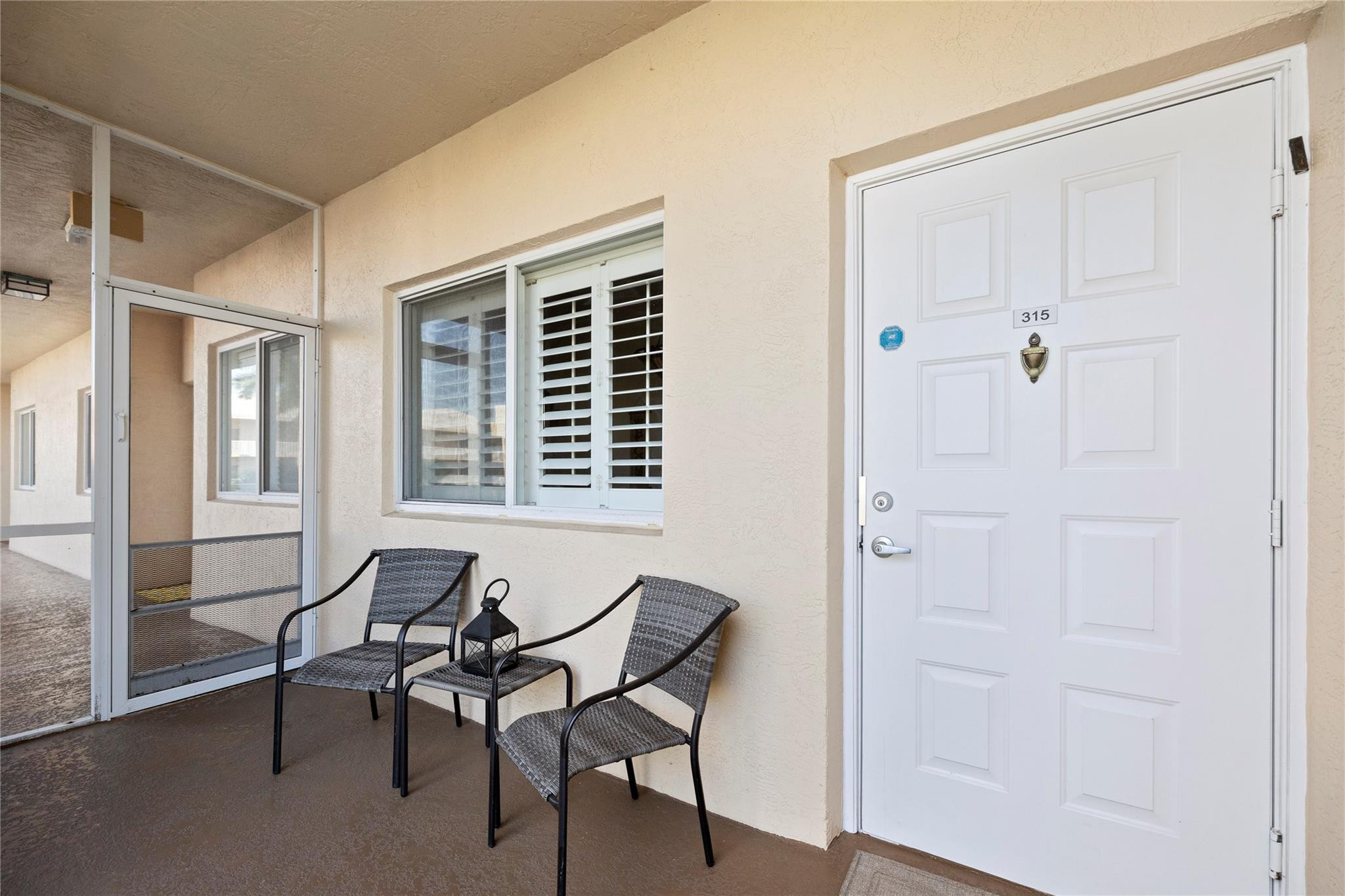 7775 Yardley Drive, Unit 315 Fort Lauderdale, FL 33321 - Photo 2 of 37 Screened Porch Ent