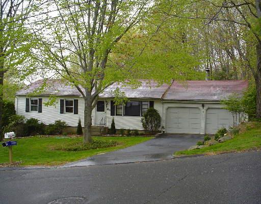 61 Ceil Road Trumbull, CT 06611 - Photo 1 of 1 a front view of house with yard and green space