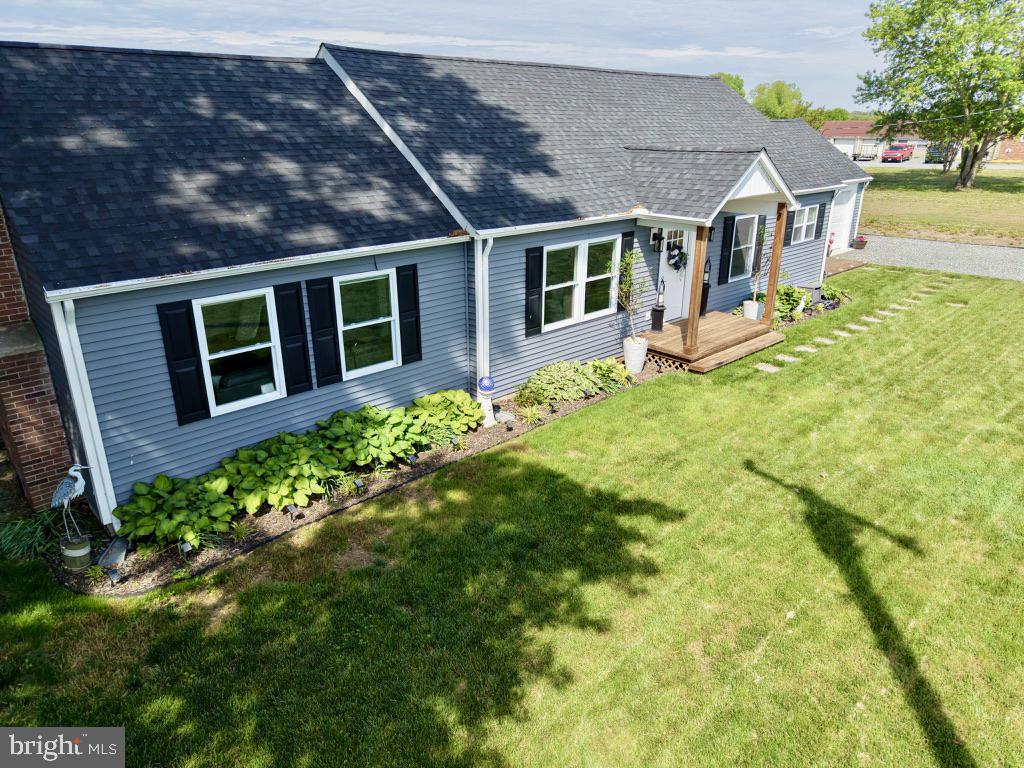 25485 Hignutt Road Denton, MD 21629 - Photo 48 of 52 a view of a house with a garden