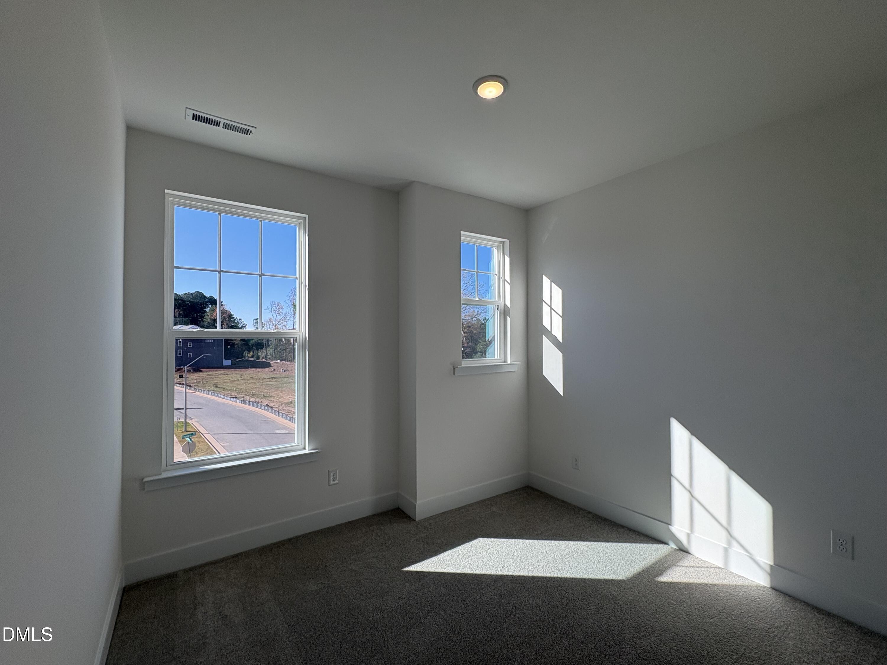 6046 Dunzo Drive Raleigh, NC 27617 - Photo 12 of 44 a view of livingroom with window
