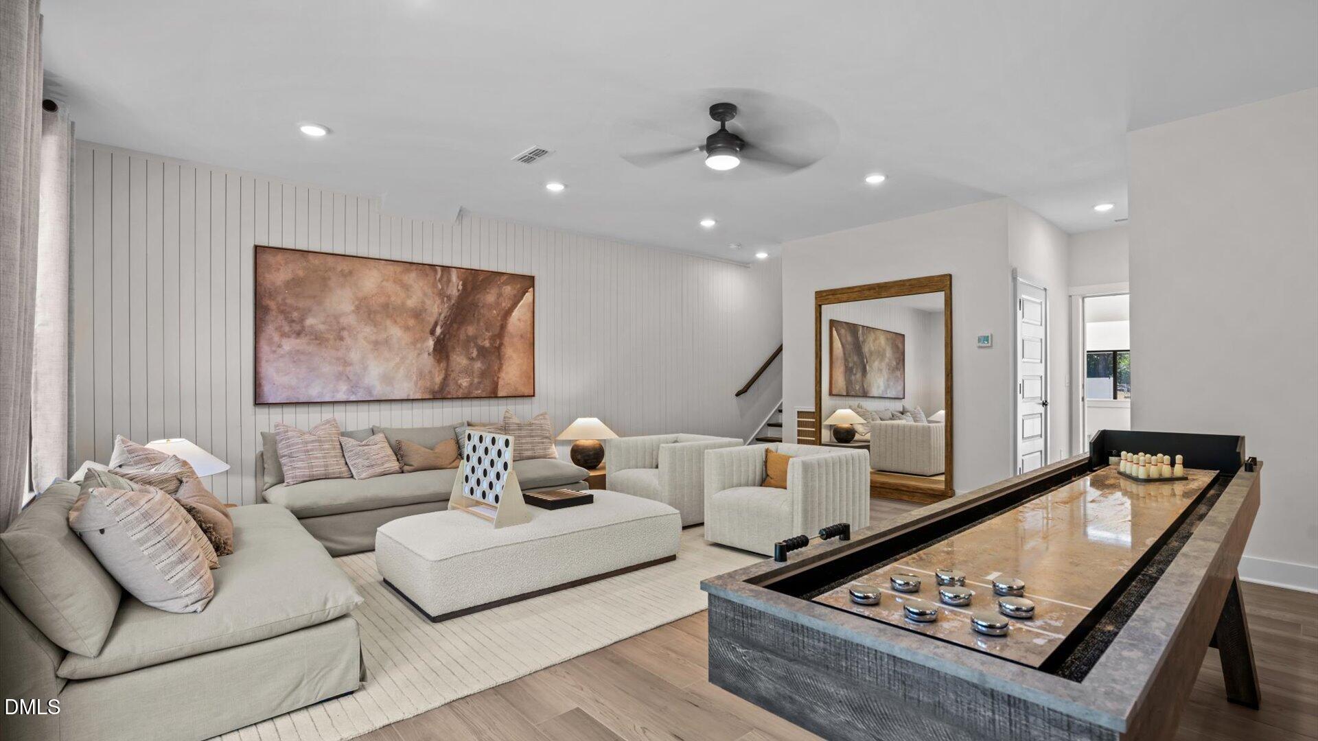 6046 Dunzo Drive Raleigh, NC 27617 - Photo 39 of 44 a living room with furniture and a couch