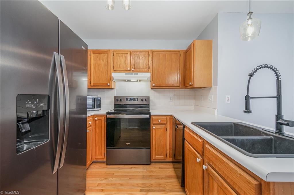 5401 Running Mead Road Pleasant Garden, NC 27313 - Photo 5 of 24 Kitchen with recently updated Whirlpool appliance