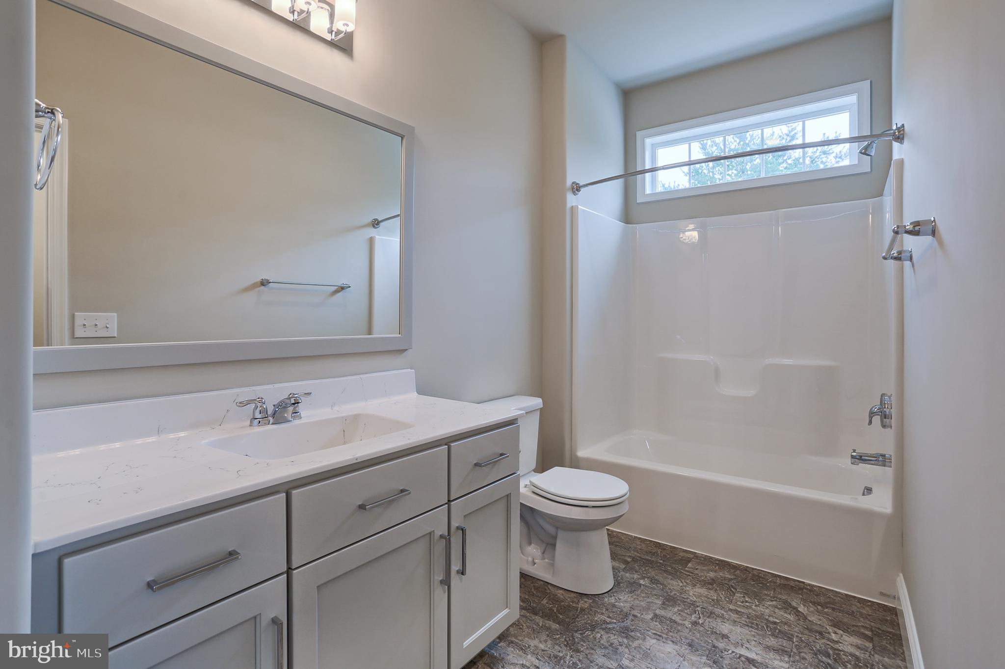 111 Starlight Lane Lebanon, PA 17046 - Photo 11 of 30 a bathroom with a sink a toilet and shower
