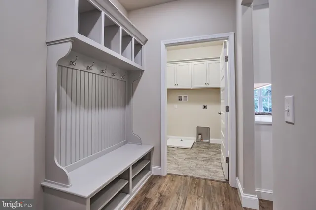 a view of front door and bedroom