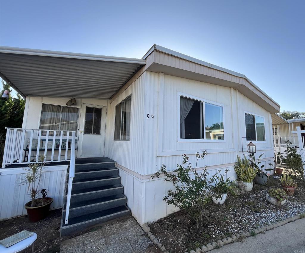 1810 Hillsdale Road, Unit 99 El Cajon, CA 92019 - Photo 2 of 15 a front view of a house with stairs