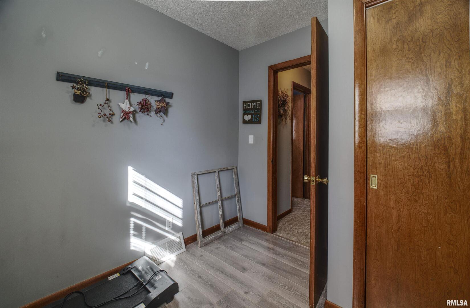 872 5th Avenue North Clinton, IA 52732 - Photo 14 of 19 wooden floor in a gallery