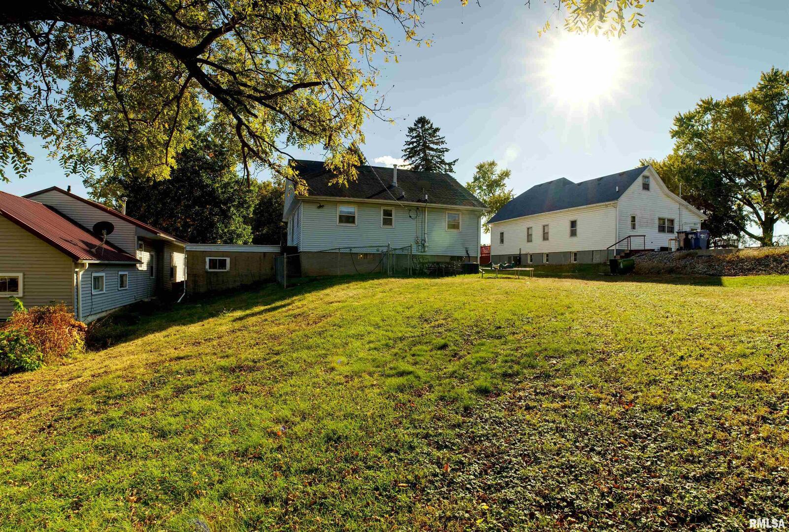 872 5th Avenue North Clinton, IA 52732 - Photo 4 of 19 a view of a house with a yard