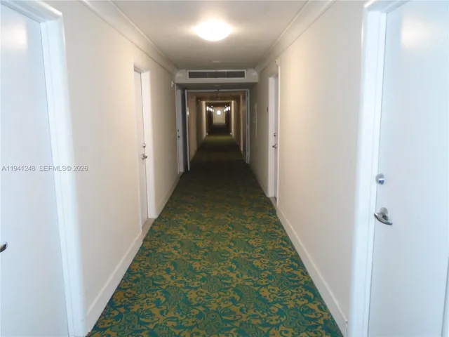 a picture of a wall with a large mirror