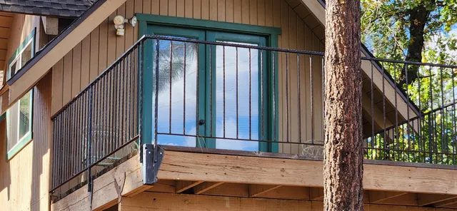 a kitchen with stainless steel appliances granite countertop a refrigerator and a stove