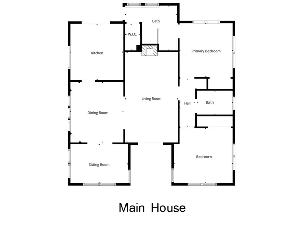 a picture of a bathroom with a white wall