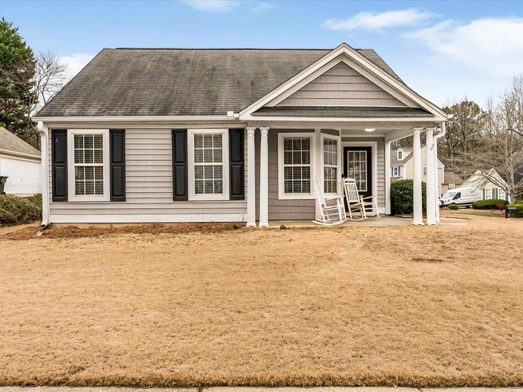 front view of a house with a yard