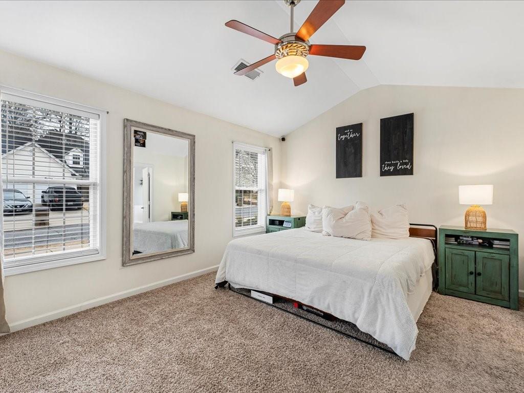 301 Summerstone Court Canton, GA 30114 - Photo 17 of 31 a bedroom with a large bed and a window