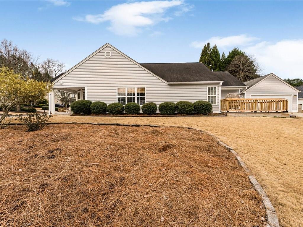 301 Summerstone Court Canton, GA 30114 - Photo 28 of 31 a view of a house with a yard