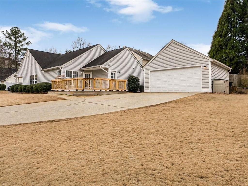 301 Summerstone Court Canton, GA 30114 - Photo 29 of 31 a view of a house with a yard