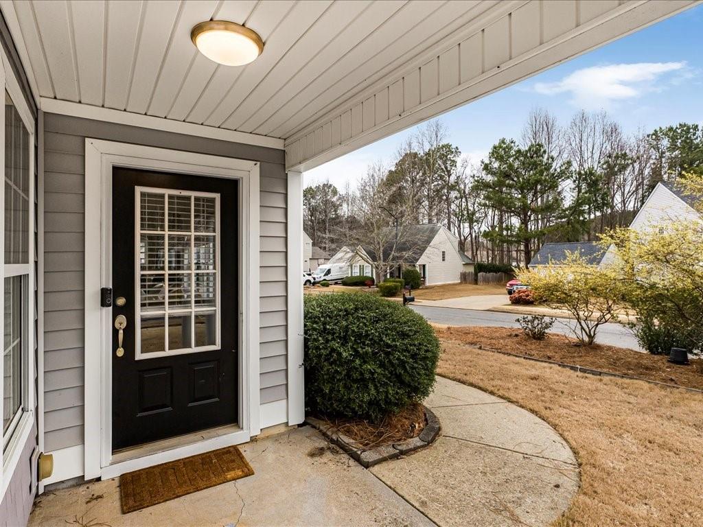 301 Summerstone Court Canton, GA 30114 - Photo 4 of 31 a view of a entrance door of the house