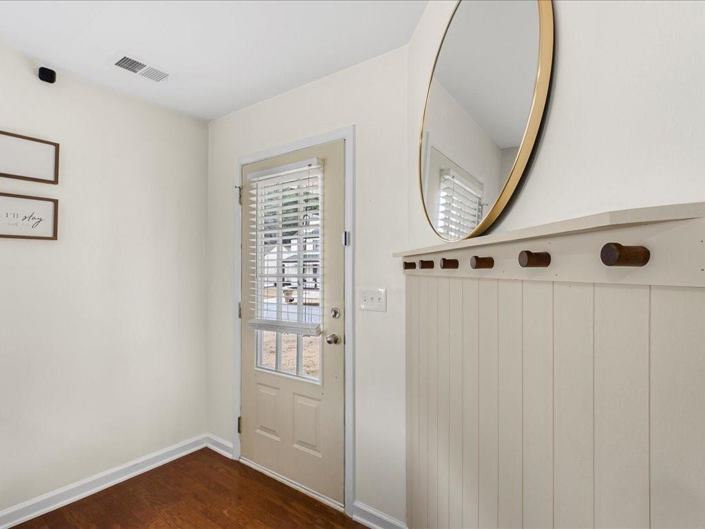 301 Summerstone Court Canton, GA 30114 - Photo 5 of 31 a view of an entryway with wooden floor