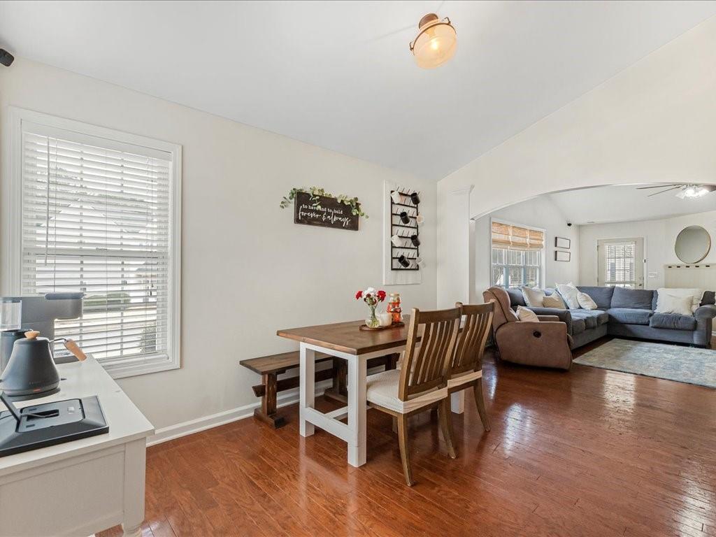 301 Summerstone Court Canton, GA 30114 - Photo 10 of 31 a living room with furniture and a wooden floor