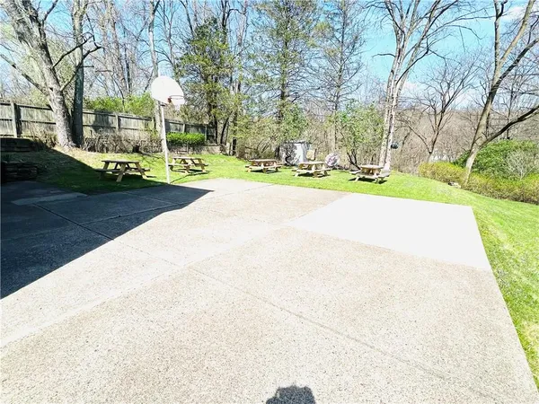 a view of snow on the side of the road