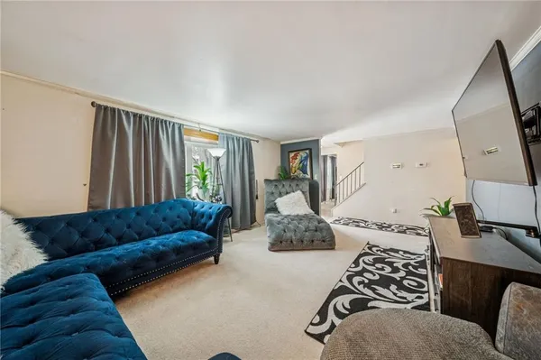 a living room with furniture and a couch