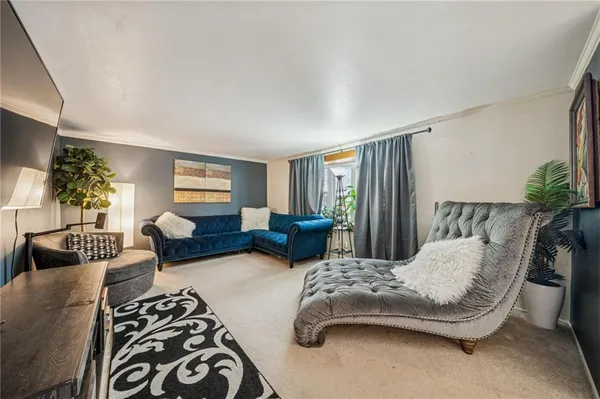 a bedroom with furniture and a couch