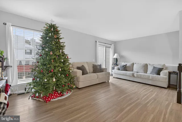 a bedroom with a bed and a book shelf