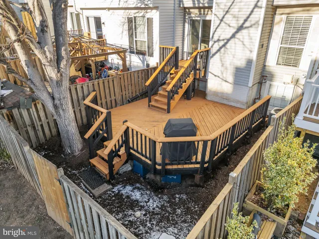 a kitchen with a sink a window and appliances