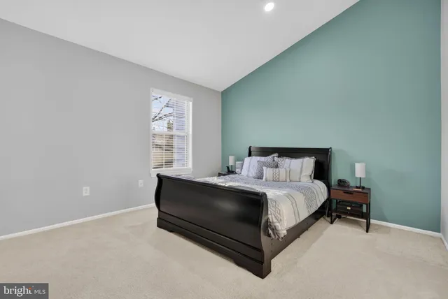 a bathroom with a sink toilet and a mirror