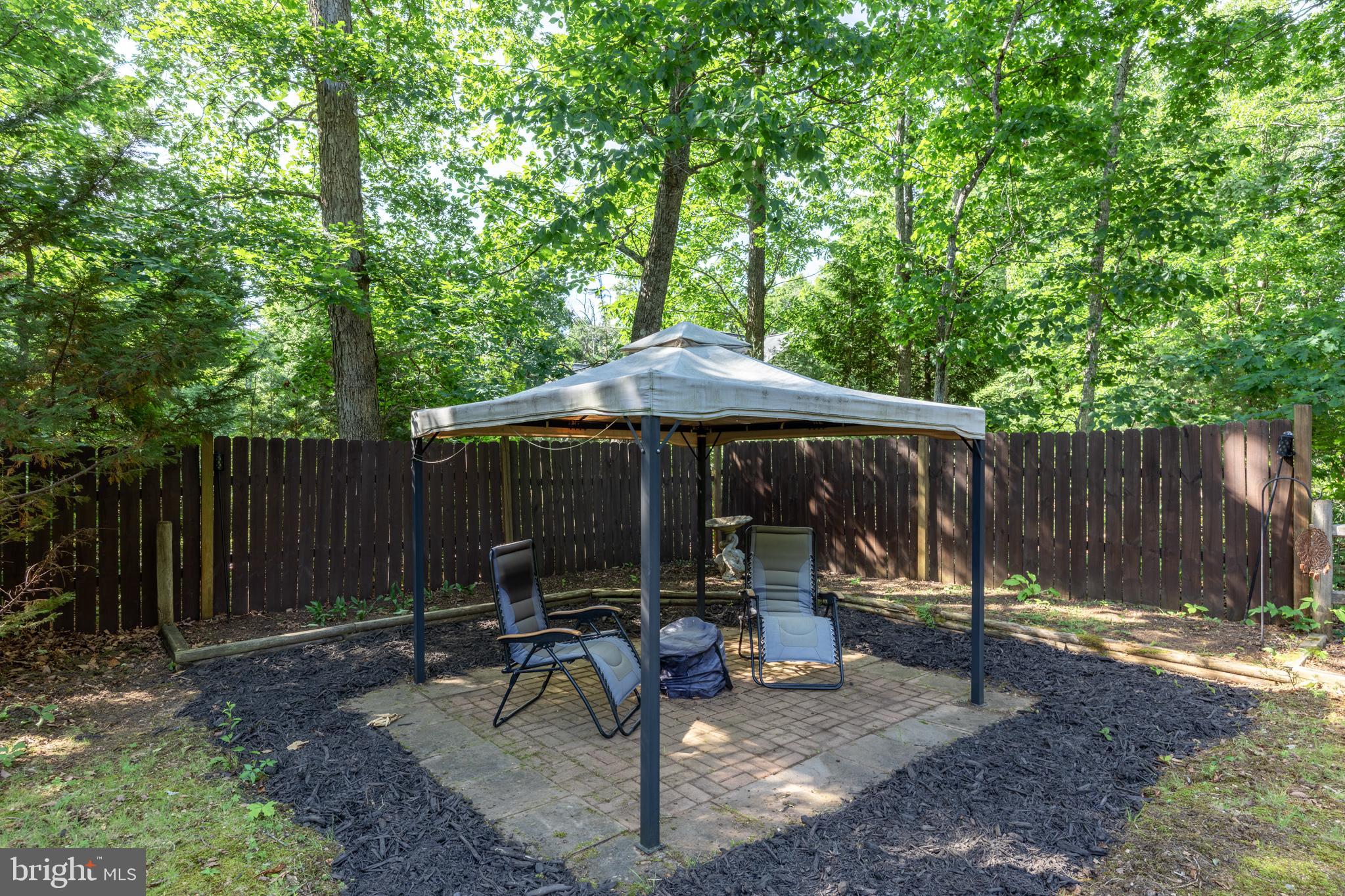 19306 Frazier Road Culpeper, VA 22701 - Photo 45 of 49 Sitting area or fire pit with hardscaping.