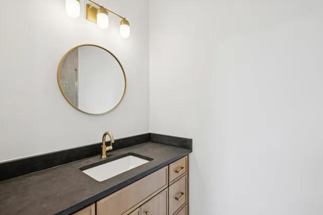 a bathroom with a shower and toilet