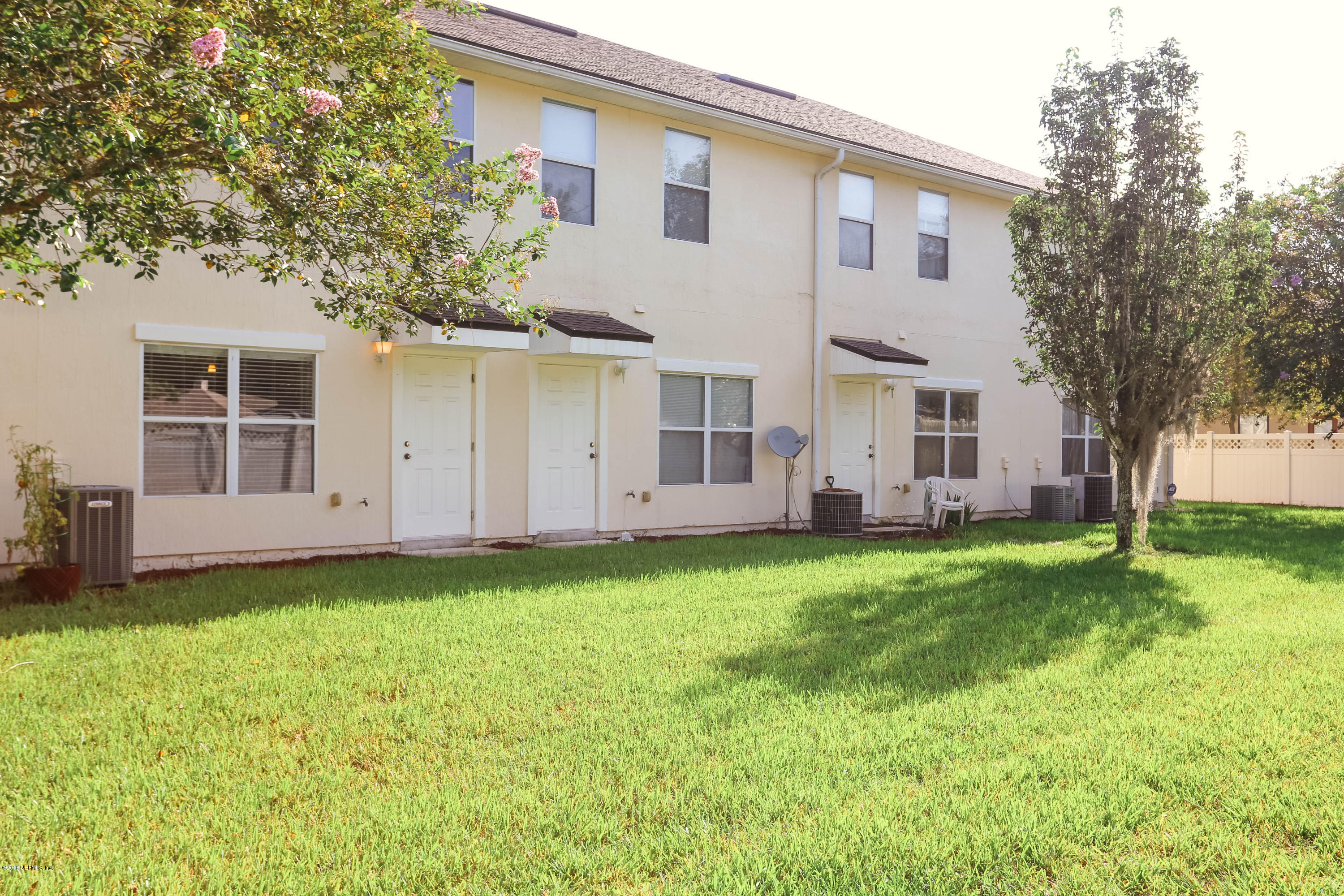 1205 Southern Stream Court Jacksonville, FL 32259 - Photo 25 of 42 a view of a backyard with plants and large tree