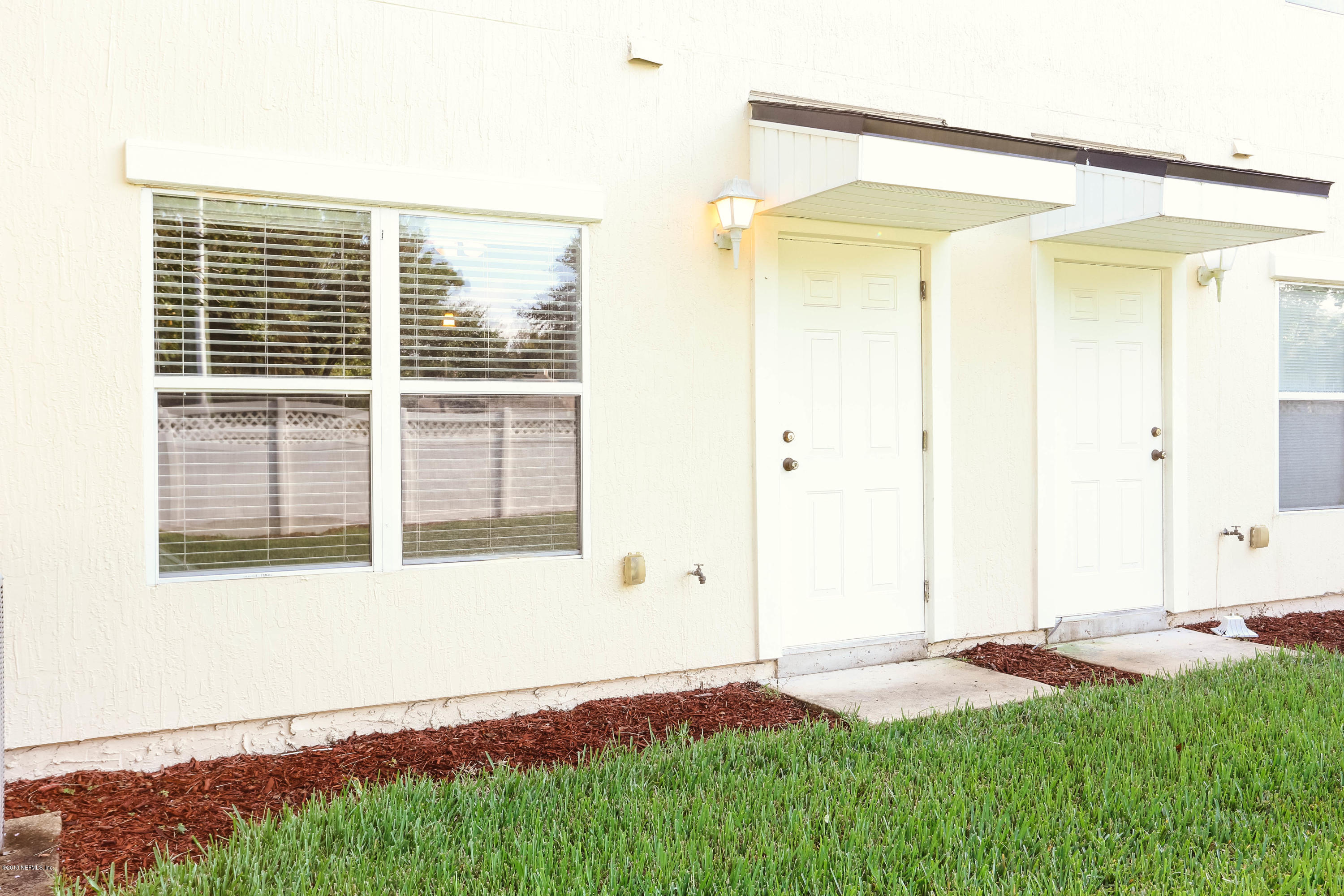1205 Southern Stream Court Jacksonville, FL 32259 - Photo 26 of 42 a view of backyard with entryway