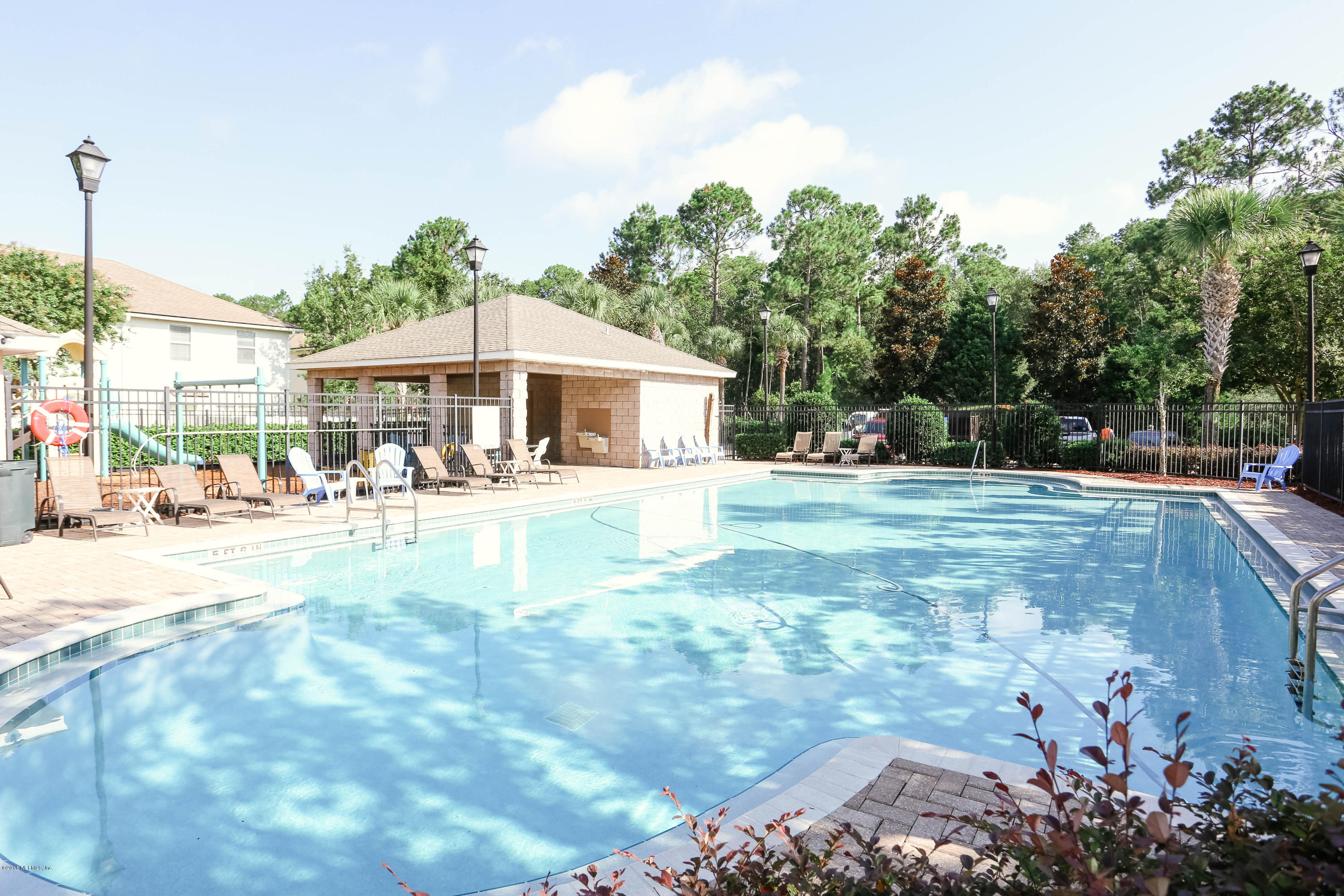 1205 Southern Stream Court Jacksonville, FL 32259 - Photo 33 of 42 a view of a swimming pool with a patio