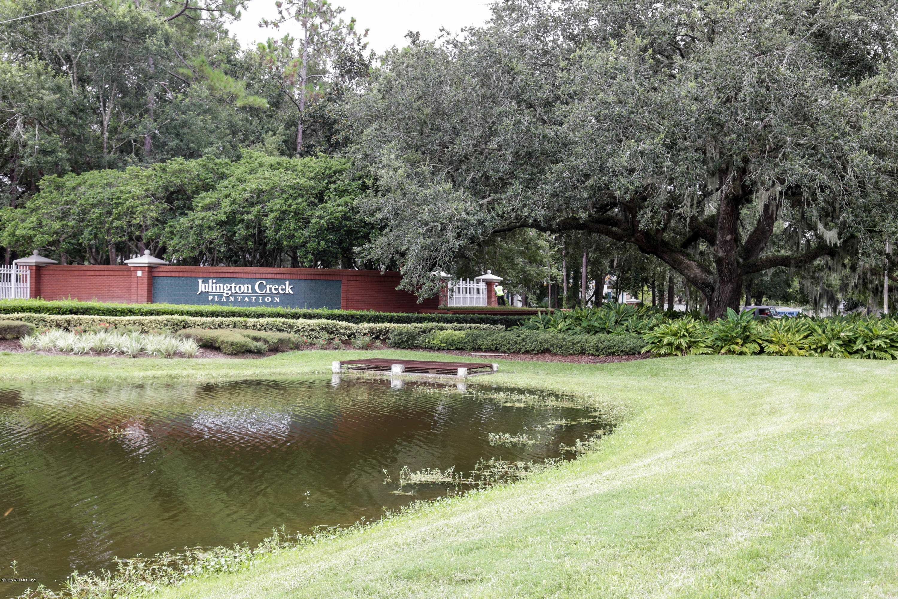 1205 Southern Stream Court Jacksonville, FL 32259 - Photo 34 of 42 a view of swimming pool with trees and trees in the background