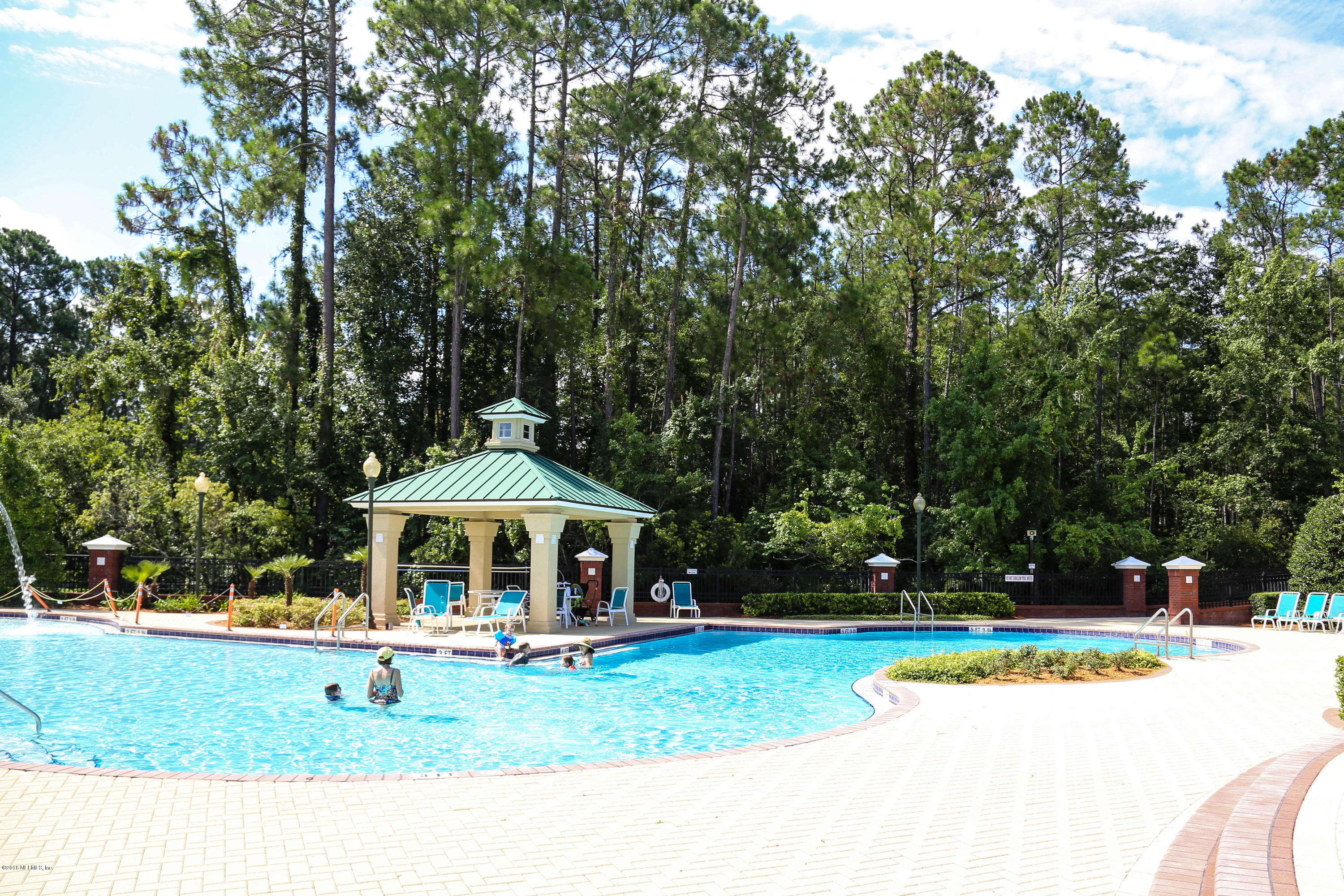1205 Southern Stream Court Jacksonville, FL 32259 - Photo 37 of 42 a view of house with garden space and trees