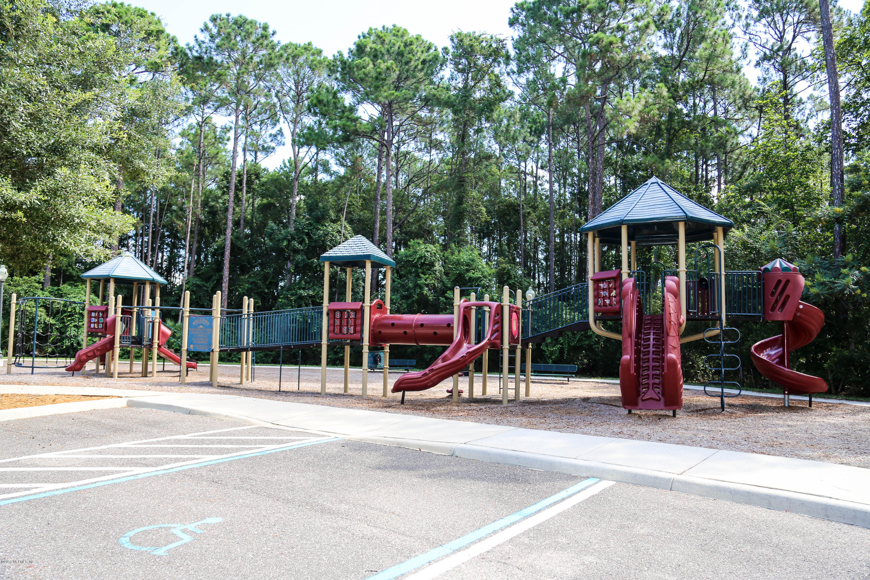 1205 Southern Stream Court Jacksonville, FL 32259 - Photo 39 of 42 a view of a park with swings and slides