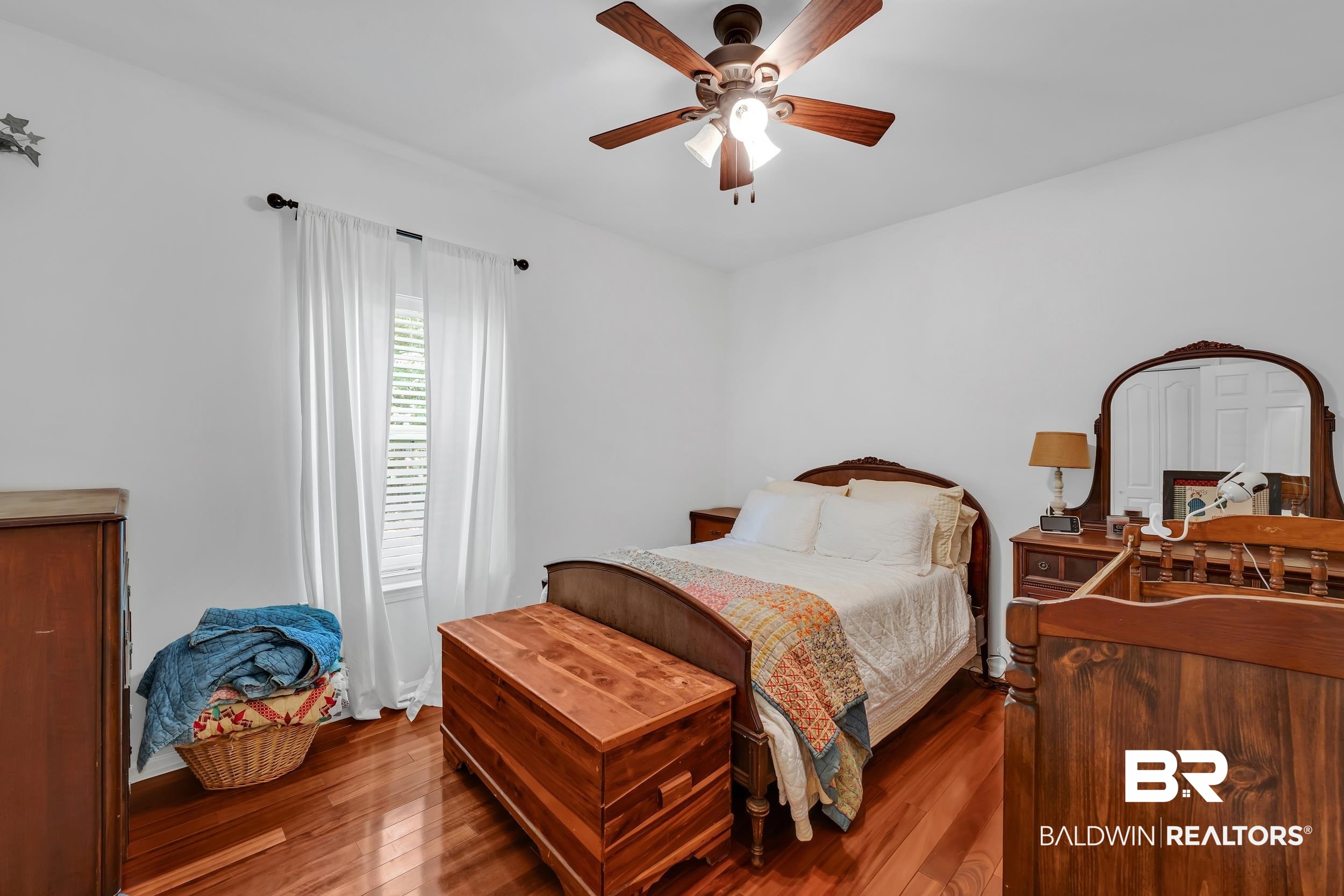 2 Navy Lane Daphne, AL 36527 - Photo 21 of 28 Bedroom featuring wood finished floors and ceiling fan