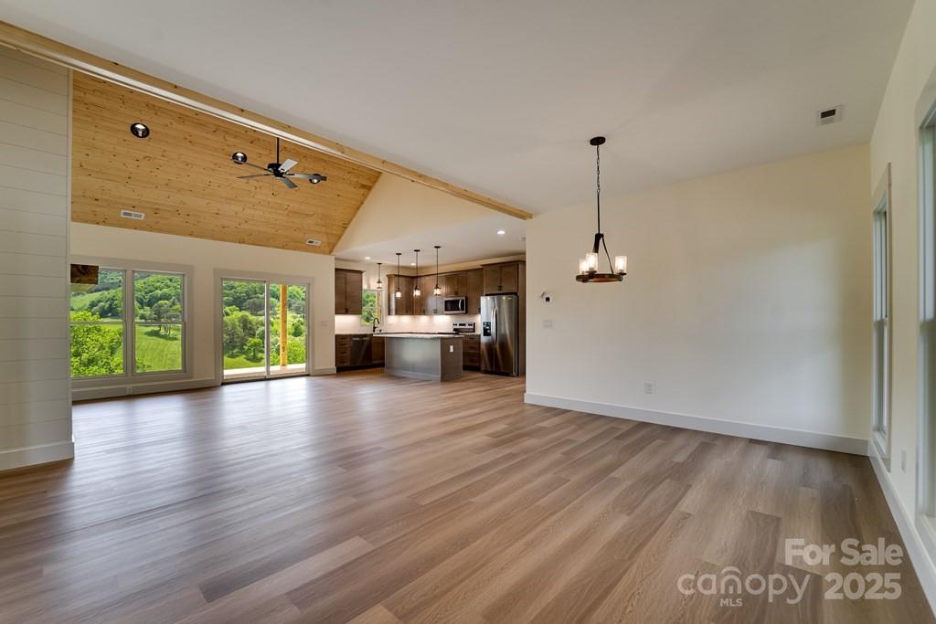70 Knox Best Street Clyde, NC 28721 - Photo 12 of 33 a view of a room with wooden floor