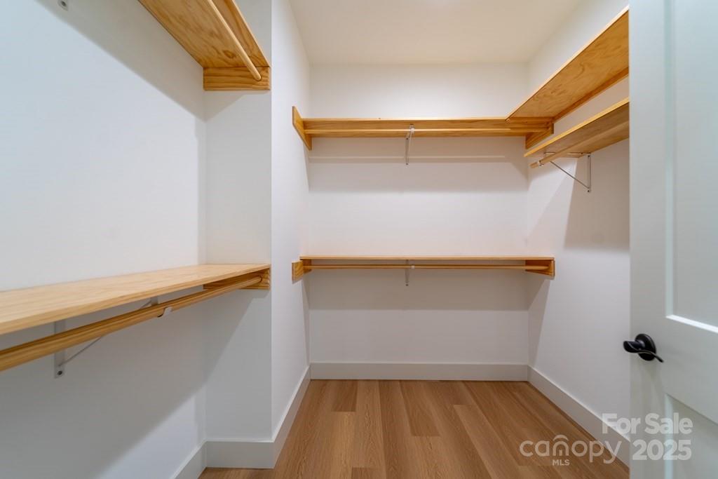 70 Knox Best Street Clyde, NC 28721 - Photo 22 of 33 a view of walk in closet with empty room