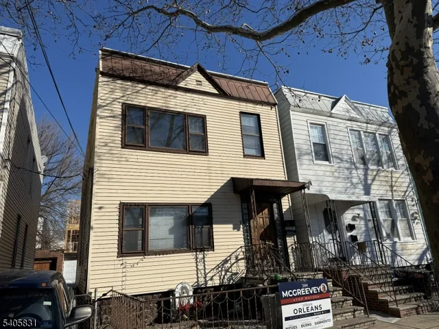 a view of a house with street
