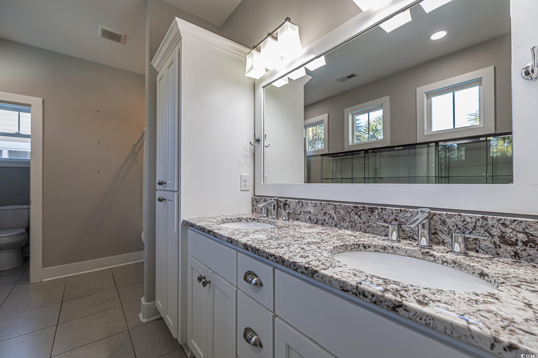 377 Waties Drive Murrells Inlet, SC 29576 - Photo 9 of 20 Bathroom with tile patterned floors, toilet, and v