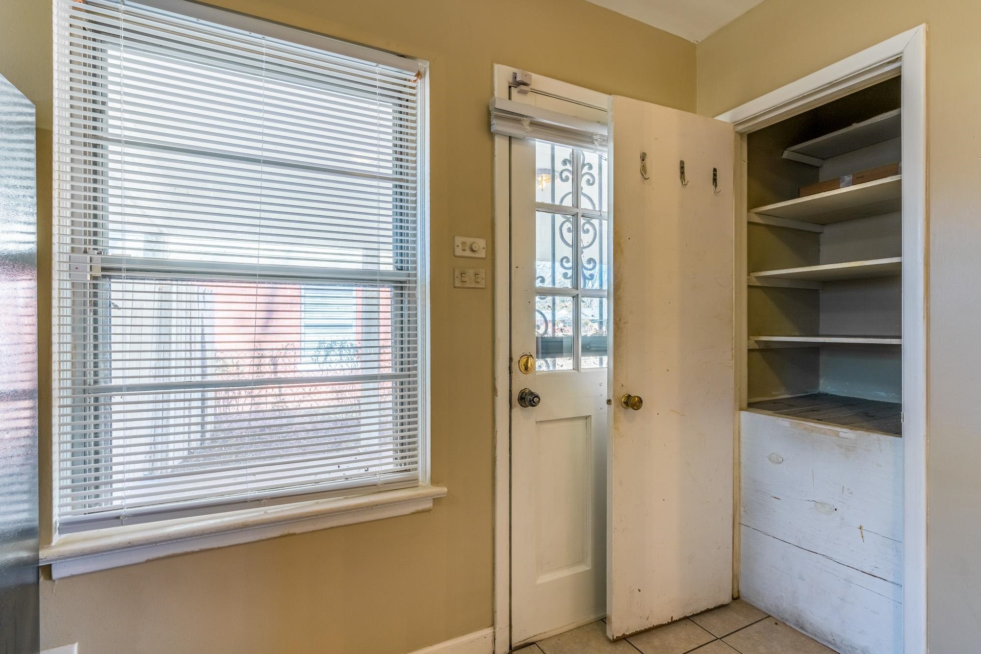 1117 South Perkins Road Memphis, TN 38117 - Photo 12 of 24 a view of a bedroom with a window