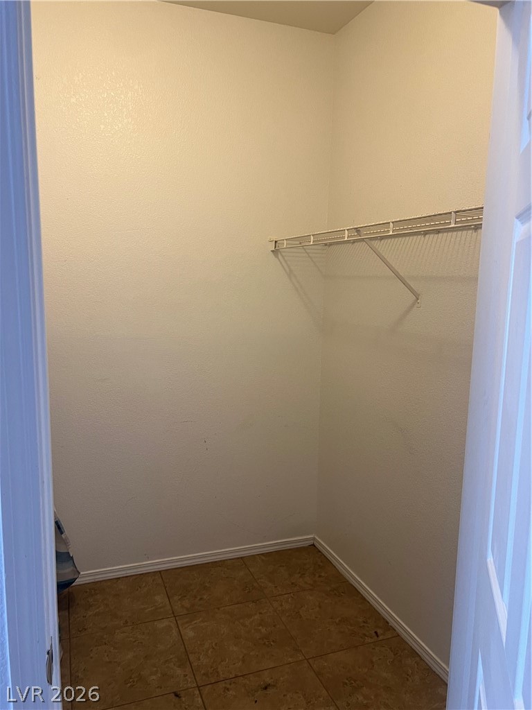 3318 North Decatur Boulevard, Unit 1174 Las Vegas, NV 89130 - Photo 14 of 23 This spacious closet offers practical storage solutions for an organized living space.