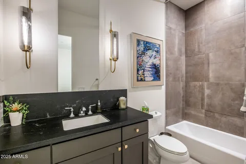 a bed room with a bed and a window