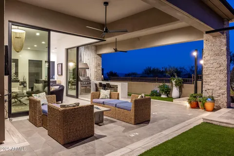 a backyard of a house with garden and patio