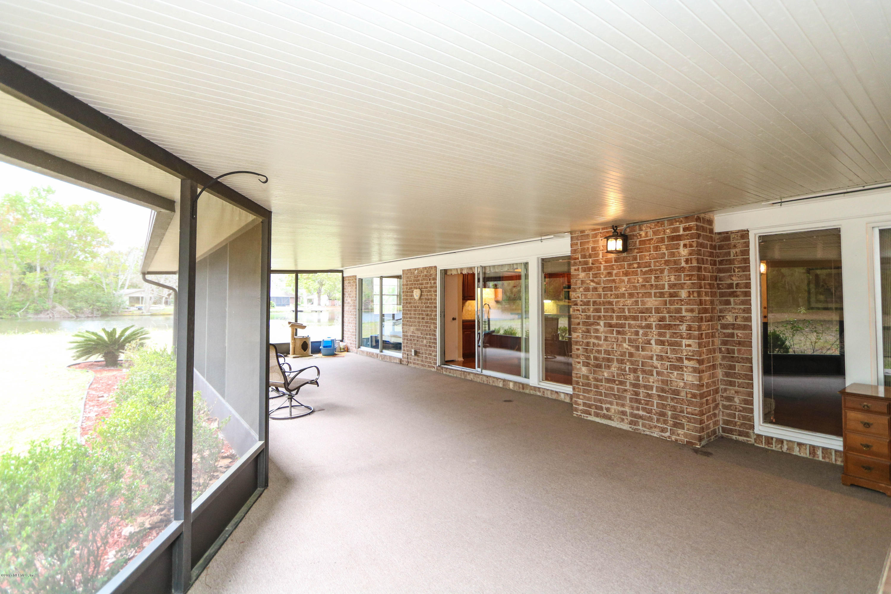 289 Holly Knowe Road Fleming Island, FL 32003 - Photo 13 of 45 Huge Covered Screened Patio