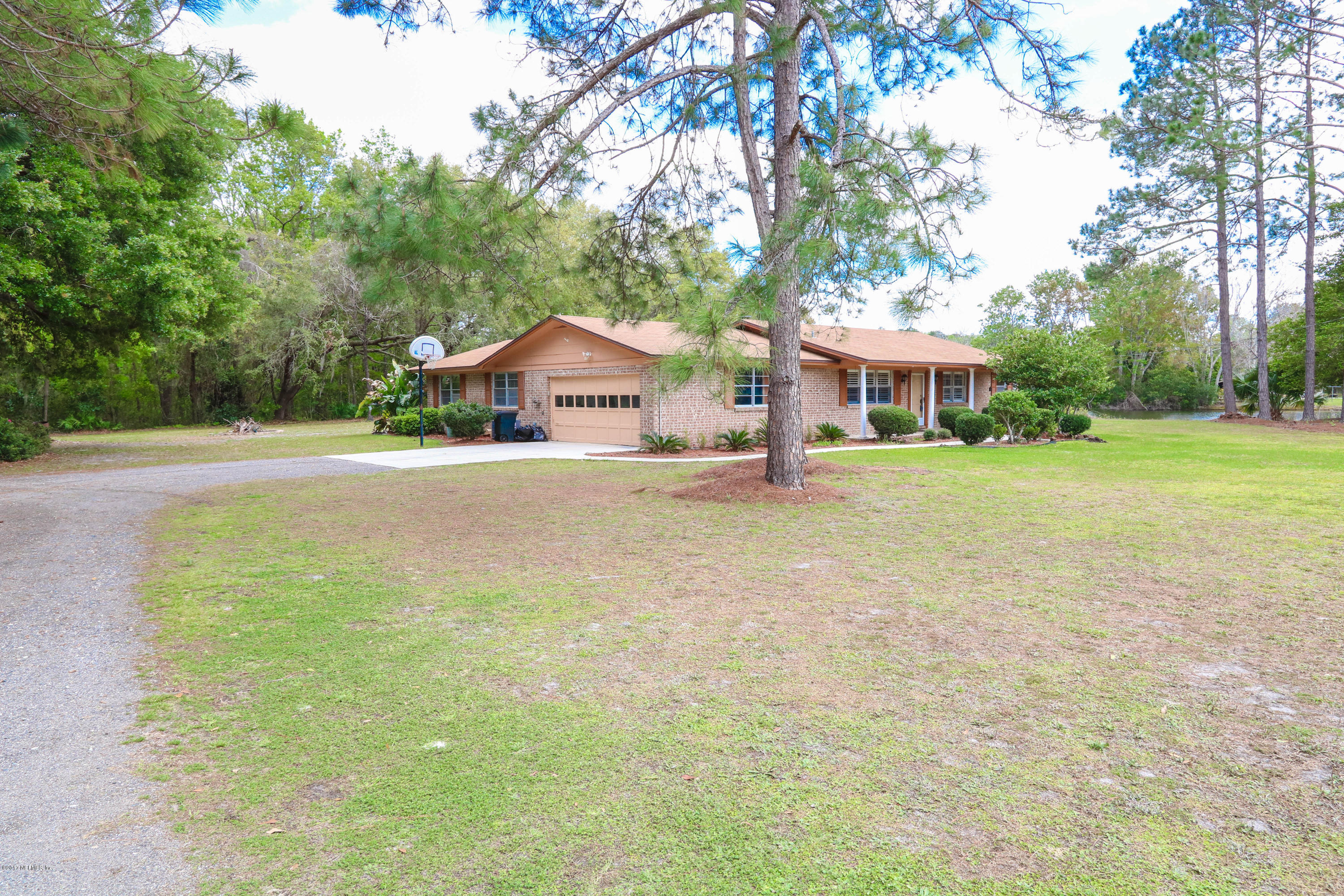 289 Holly Knowe Road Fleming Island, FL 32003 - Photo 14 of 45 Side Entry Garage